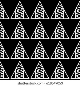 Seamless vector pattern. Black and white geometrical background with hand drawn decorative tribal elements. Print with ethnic, folk, traditional motifs. Graphic vector illustration