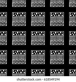 Seamless vector pattern. Black and white geometrical background with hand drawn decorative tribal elements. Print with ethnic, folk, traditional motifs. Graphic vector illustration