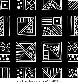 Seamless vector pattern. Black and white geometrical background with hand drawn decorative tribal elements. Print with ethnic, folk, traditional motifs. Graphic vector illustration