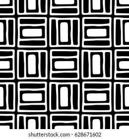 Seamless vector pattern. Black and white geometrical background with hand drawn decorative tribal elements. Print with ethnic, folk, traditional motifs. Graphic vector illustration.