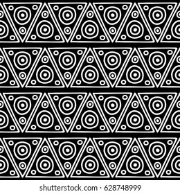 Seamless vector pattern. Black and white geometrical background with hand drawn decorative tribal elements. Print with ethnic, folk, traditional motifs. Graphic vector illustration.