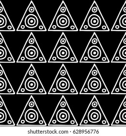 Seamless vector pattern. Black and white geometrical background with hand drawn decorative tribal elements. Print with ethnic, folk, traditional motifs. Graphic vector illustration.