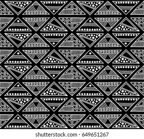 Seamless vector pattern. Black and white geometrical background with hand drawn decorative tribal elements. Print with ethnic, folk, traditional motifs. Graphic vector illustration.