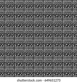Seamless vector pattern. Black and white geometrical background with hand drawn decorative tribal elements. Print with ethnic, folk, traditional motifs. Graphic vector illustration.