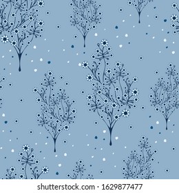 Seamless vector pattern with blooming blue trees. Beautiful forest background.  Winter wallpaper design.