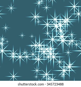 Seamless vector pattern. Blue abstract Christmas glittering background with stars. 