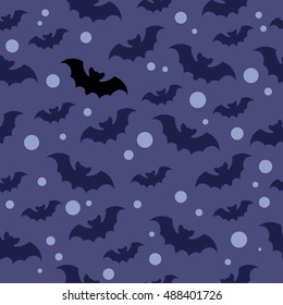 Seamless vector pattern with blue and black bats on a dark blue background. Halloween background. Night horror illustration.