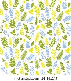 Seamless vector pattern with blue, green and yellow leaves and branches