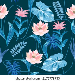 Seamless vector pattern of blue and pink exotic flowers. Tropical plant and palm leaves. Jungle bacground for fabric, textile, wallpaper