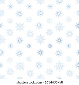 Seamless vector pattern with blue subtle elegant snowflakes on a white background.
