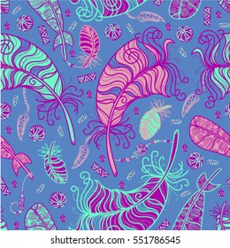 Seamless vector pattern in bohemian style with feathers, beads and fangs. Pink, purple and cyan on blue background.