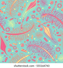 Seamless vector pattern in bohemian style with feathers, beads and chinese coins. Orange, pink and yellow on turquoise background.