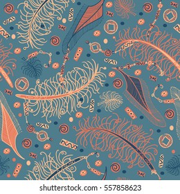 Seamless vector pattern in bohemian style with feathers, beads and chinese coins. Orange and dark turquoise colors.