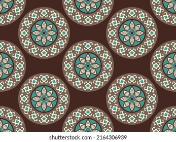 Seamless vector pattern in boho style. Round ethnic floral ornament. Decorative geometric print for textiles, wallpapers.