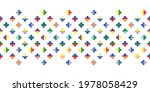 Seamless vector pattern border with four leaf clover symbols in rainbow colours. Regularly repeating geometric flower shapes for fabrics, prints and themed stationery. 