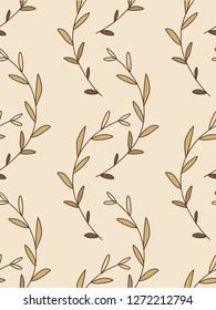 Seamless vector pattern with branches with brown leaves on light brown background