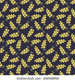 Seamless vector pattern with branches of yellow flowers on a dark background