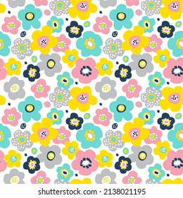 Seamless vector pattern with bright colorful flowers on white background. Modern flowers fabric pattern. Floral pattern for fabrics, textile, wallpapers, etc.
