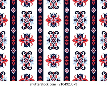 Seamless vector pattern with bright floral ornaments. Folk design for textiles. Bright folklore print for fabrics with ethnic motifs. Ornamental stripes in the oriental style. 
