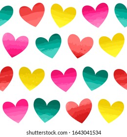 Seamless vector pattern with bright watercolor effect hearts.