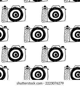Seamless vector pattern camera a white background.