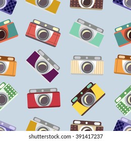Seamless vector pattern. Cameras in flat design.