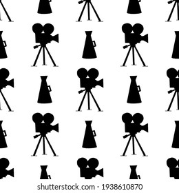 Seamless vector pattern with cameras and megaphones on a white background.