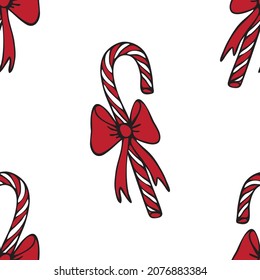 Seamless vector pattern with candy cane on white background. Simple Christmas sweet wallpaper design. Decorative winter festive fashion textile. 