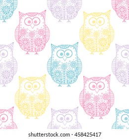 Seamless vector pattern with cartoon doodle owls. Cute birds with hand drawn floral ornament. Color animal silhouettes on white background. 