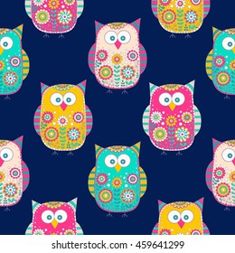 Seamless vector pattern with cartoon doodle owls. Cute birds with hand drawn floral ornament. Bright color owls on dark background. Nice design for kids.