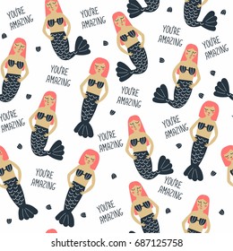 Seamless vector pattern with cartoon mermaids and the words "you're amazing."