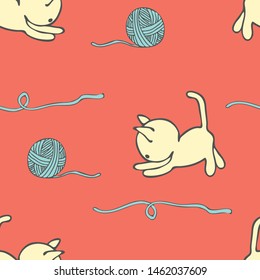 Seamless vector pattern of cartoon white kittens playing with blue yarn ball on pink background. Animal cat wallpaper design. Cute childlike fashion textile.