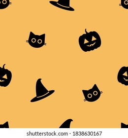 Seamless vector pattern with cats, pumpkins and hats, halloween pattern