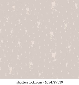 Seamless vector pattern. Champagne splashes on a beige wall. Grunge style. Vector color background.