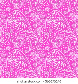 Seamless vector pattern. Chaotic background with closeup decorative pink hearts 