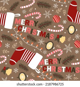 Seamless vector pattern with Christmas elements and inscription Merry Christmas. For fabrics, wrapping paper, wallpapers.