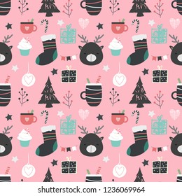 Seamless vector pattern in Christmas theme with reindeer, christmas decorations and sweets. Perfect for greeting cards, wrapping paper, scrapbooking, etc.