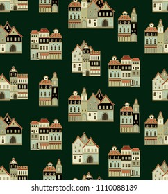 Seamless vector pattern with classic European houses on green background
