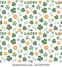 Seamless vector pattern of clovers, shamrocks, golden coins and sign I'm lucky with horseshoe. This repeating pattern is perfect for a St Patricks Day background.