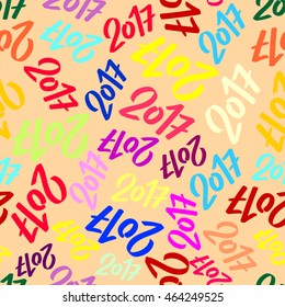 Seamless vector pattern of colored 2017 on beige background.