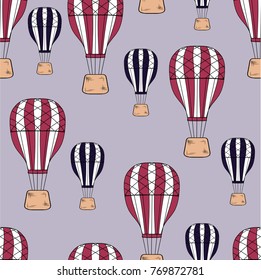 Seamless vector pattern. Colored air baloons pattern on the tender violet background.
