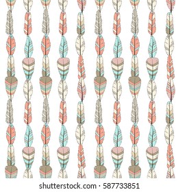 Seamless vector pattern with colored feathers on white.Bohemian style feathers for prints,wrapping, fabric and other seamless design. Seamless texture.