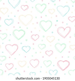 Seamless vector pattern with colored pastel doodle hearts. Delicate background with hearts for Valentine's Day, wedding decoration and children's design.