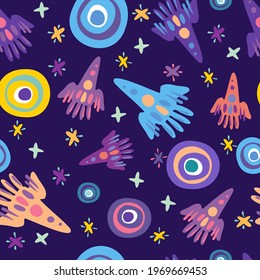 Seamless vector pattern colorful design detailed illustration of rockets, spaceships and planets in bright tones. The design is perfect for wallpaper, wrapping paper, packaging, textiles, clothes