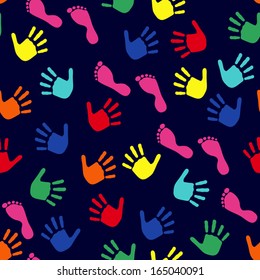 Seamless vector pattern with colorful imprints of children's hands and feet on a dark blue background
