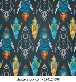 Seamless vector pattern of colorful kid hand drawn style rockets 
