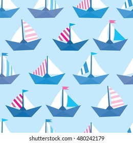 Seamless vector pattern with colorful paper ships. Sea texture