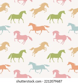 Seamless vector pattern with colorful running horses. Pastel colored horses on a beige background. Graphic print for children