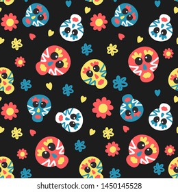 Seamless vector pattern with colorful skulls and hearts on dark background. For holiday Halloween, textile, background, wrapping paper, Wallpaper, fabric. 