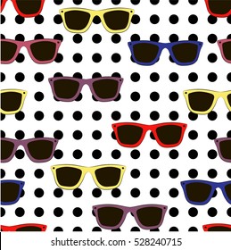 Seamless vector pattern. Colorful sunglasses for vocation on the black and white polka dots background.